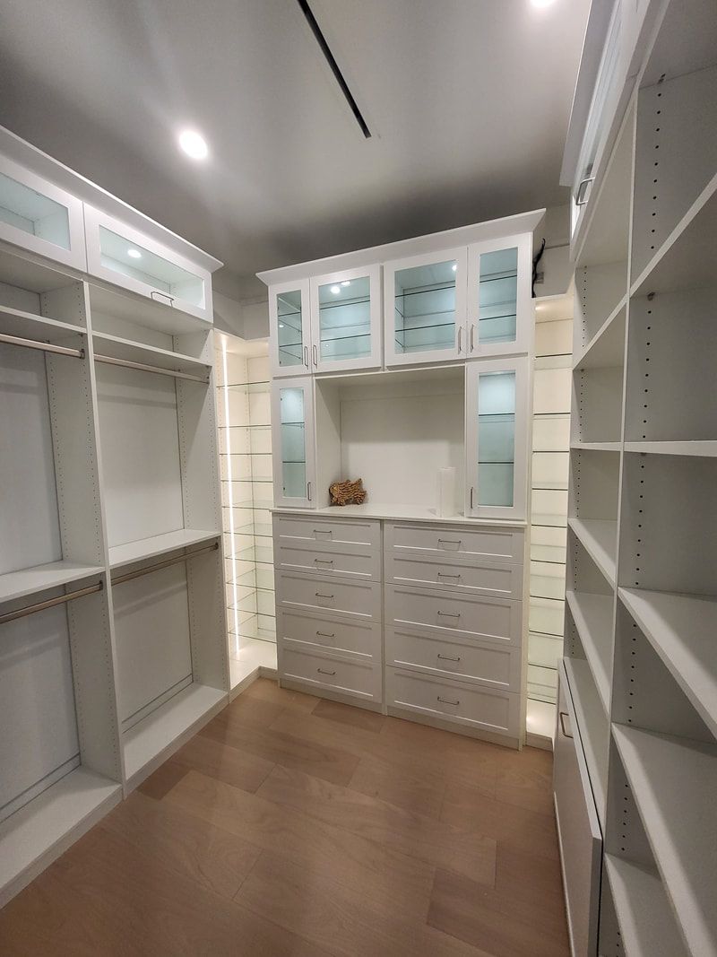Custom walk-in closet with full organization system in Florida