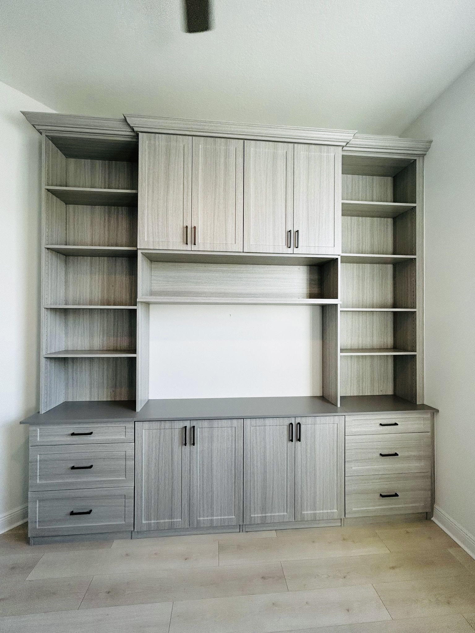 Luxury custom walk-in closet with organizer system by Dream Closets LLC in Sarasota FL